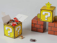 Set of 12 Super Mario Bros Favor Boxes - Brick, Question Mark, Sewer Pipe designs with Coins, Stars, Venus Flytrap. 4 of each box in a set.