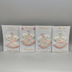 Customized crochet favor dress with pink bow and hanger. Personalized card and dress for Quinceanera or baby shower. FREE SHIPPING! Set of 6