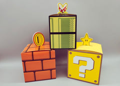 Set of 12 Super Mario Bros Favor Boxes - Brick, Question Mark, Sewer Pipe designs with Coins, Stars, Venus Flytrap. 4 of each box in a set.